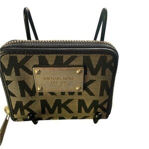 Michael Kors Black and Tan Logo Wallet measuring approximately 4 x 3”